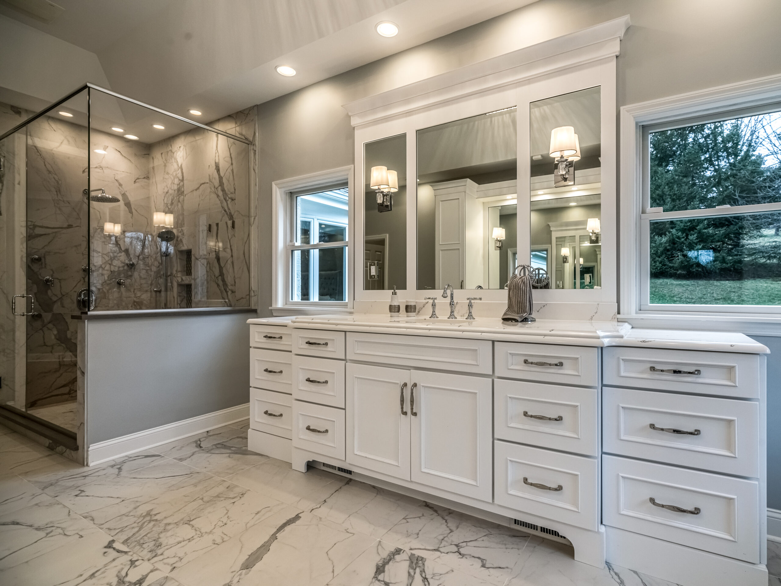 Bathroom: vanity with mirrors, built by Premier Custom Builders